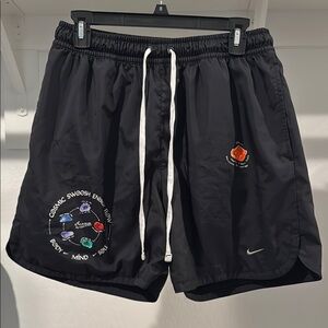 Nike Black Athletic Shorts with Swoosh Logo and Multiple Graphic Designs